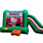 Hello Kitty bounce house 4-in-1 combo with slide, climbing wall, and basketball hoop in a backyard