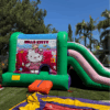 "Hello Kitty bounce house 4-in-1 combo with slide, climbing wall, and basketball hoop in a backyard"